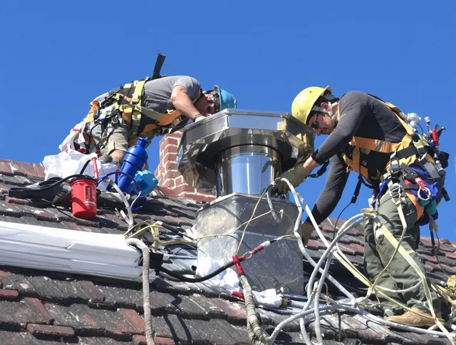 Protective chimney cap installed by Bell Gardens Chimney Sweep in Bell Gardens, CA